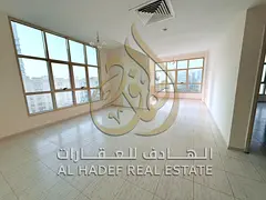 Two-bedroom apartment with a living room in Al Majaz 2 area. Free air conditioning, free maintenance