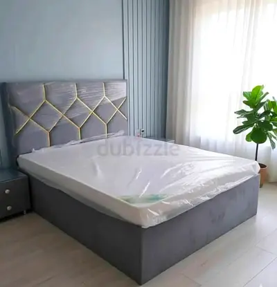Brand New Grey upholstered Queen size bed with storage and padded headboard ans Mattress