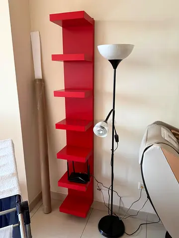 Tall red wall shelf unit – slim vertical storage, good condition