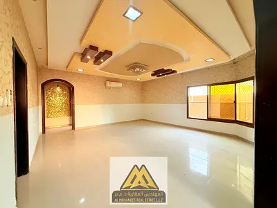 featuring 5 master bedrooms, a master majlis, a large living room, a maid’s room, and a main kitchen. Ideal for large families in a prime location cl