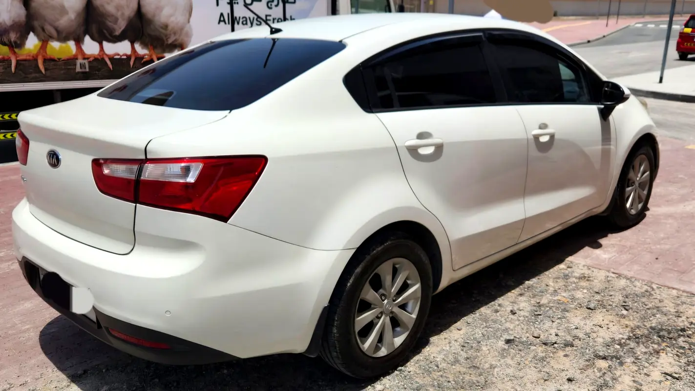 Kia Rio 2014 — photo 1 of 11