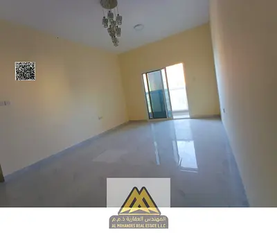 For rent: 1-bedroom apartment with hall in Al Jurf 3, Ajman. Master room, 2 balconies, central AC. AED 32,000 yearly in 6 payments, prime location on