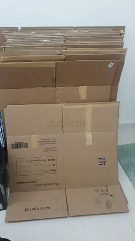 Bundle of Flattened Corrugated Cardboard Boxes - Various Sizes 23 nos of 45x 45x 70 or 80.  Aed 130.