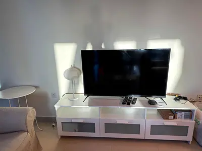 42-50 LED TV in good working condition with stand and remotes