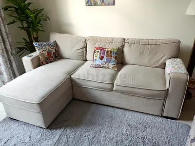 Beige fabric 3-seater storage sofa with pull-out bed option