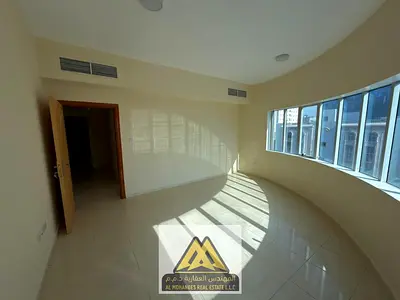 A unique opportunity: a two-bedroom apartment with a living room in a strategic location on Sheikh Khalifa Street, in a vibrant area close to all serv