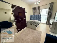 Furnished studio apartment for monthly rent in Al Yasmin Towers with separate kitchen and balcony. B
