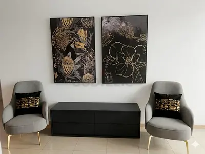 Modern black cabinet with two grey accent chairs and wall art set