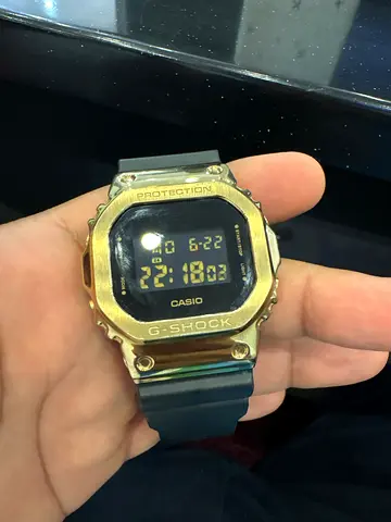Casio G-Shock Square Digital Watch with Gold Bezel