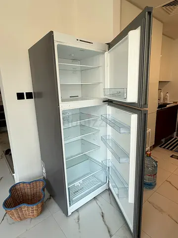 Used double-door refrigerator freezer — perfect working condition