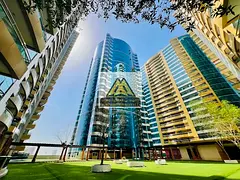Own a spacious studio in one of Ajman's renowned towers with private parking, a high floor, and 
