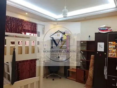 illa for sale in Sharjah, Samnan area, excellent location