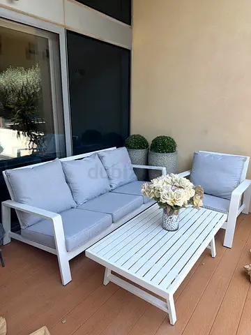 White-Gray Outdoor Sofa Set with 2 chairs, 1 sofa, and table
