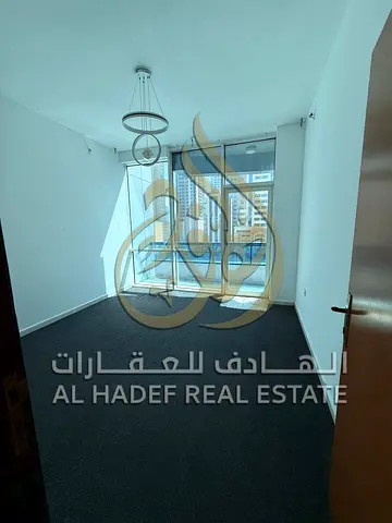 Two-bedroom apartment with a living room and two balconies in Al Khan area - Free parking - Excellent family location - Close to services - Quiet resi