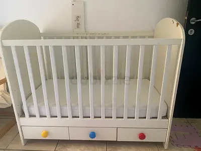 White Wooden Baby Cot/Crib with mattress and Storage Drawers.
