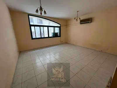 A golden opportunity for singles, two rooms and a hall in Al Majaz 1, behind the bus station and close to the Corniche, a vital location close to all