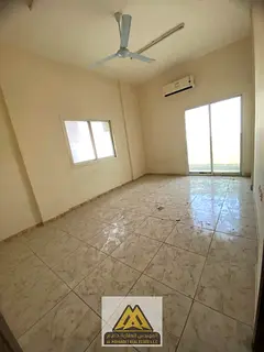 A great opportunity for annual rent in Al Rawda 3, Ajman. This spacious apartment is located on a ma