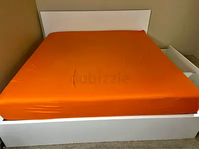 IKEA Malm king bed frame with mattress. (good condition)
