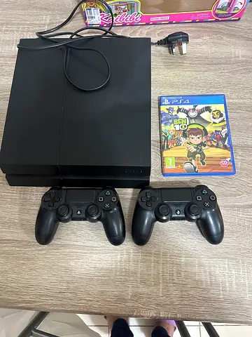 Sony PlayStation 4 Slim with 2 Controllers and Game (Good Working Condition)