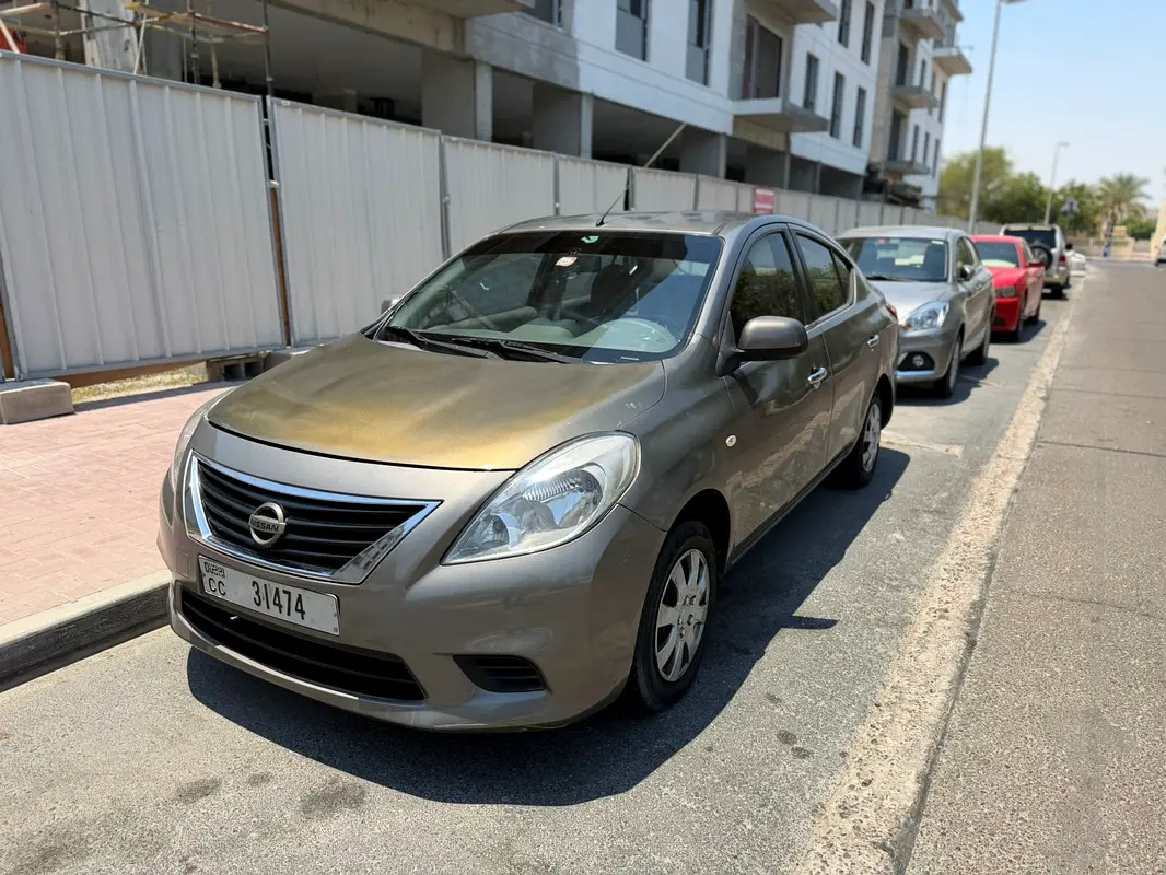 Nissan Sunny 2013 — photo 1 of 7