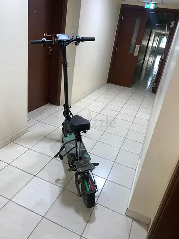 Electric Kick Scooter with Seat — Used, Good Working Condition