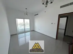 1BR apartment in Al Jurf 2 with separate living room, master bedroom, 2 bathrooms, 2 balconies, cent