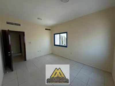 For rent in Nuaimiya 2, Ajman: Huge 1BR, central AC, free maintenance. 26K/6 chqs. Great location, easy exit to Dubai/SHJ & near services