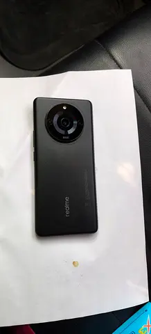 Realme smartphone with large circular camera module - used, good condition