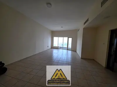 The apartment features a very large layout, built-in wardrobes, and a balcony with an open marina view.