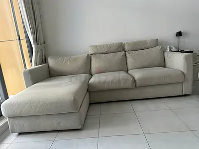For sale modern L-shape sofa with ottoman in good condition