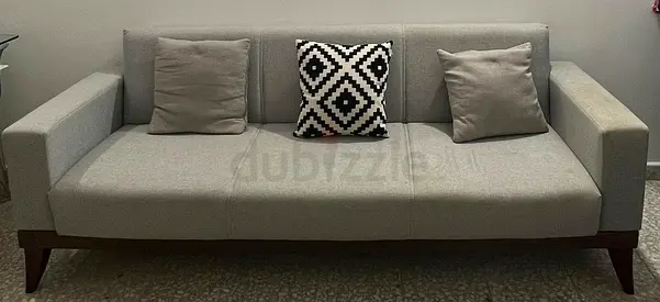 Light grey 3-seater sofa with wooden legs — good condition