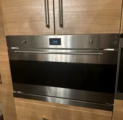 Smeg latest model built-in electric oven with push knobs 90cm