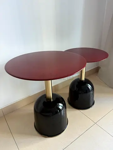 Pair of modern small round tables with glossy base
