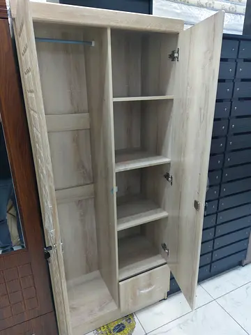 Brand New Light Oak 2-Door Wardrobe with Shelves and Drawer New For Sale