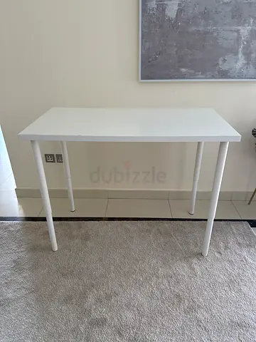 IKEA white rectangular dining/work table - good condition. Adjustable