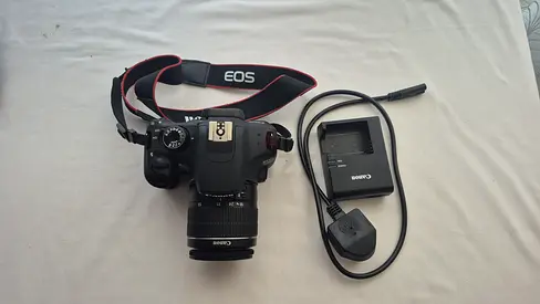Canon EOS DSLR with Kit Lens + Battery Charger (Good Working Condition)