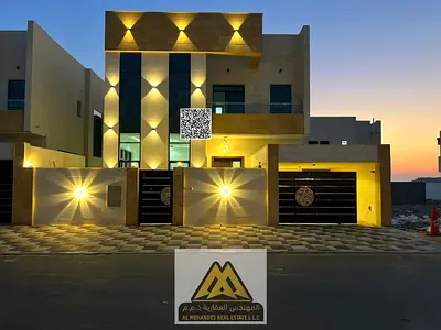 Luxury family villa for rent in Al Yasmin with spacious areas, a large internal courtyard, a separate majlis, and shaded parking