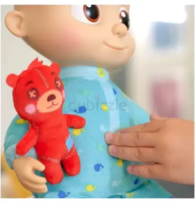 Baby doll with small red plush bear - used