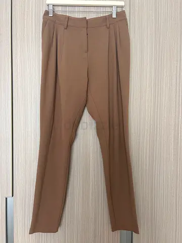 Brown slim-fit trousers — gently used