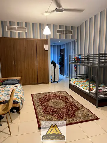 شقة فاخرة غرفتين وصالة (2BHK) بمساحة عملاقة وإطلالة مميزة في طابق مرتفع للبيع في أبراج عجمان وان (البرج 6)، منطقة الراشدية 3 عجمان، متاح عليها رهن عقا