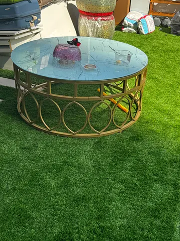 Round Glass Top Coffee Table with Decorative Metal Base