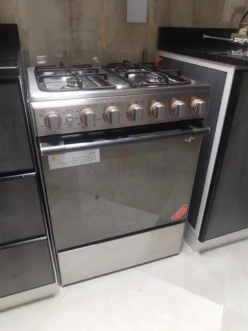 Stainless Steel 4-Burner Gas Cooker with Oven - Good Working Condition