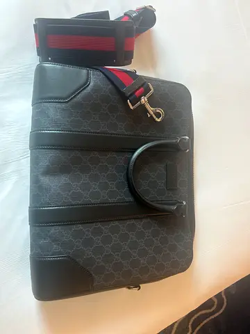 Gucci GG laptop bag 12 month old  laptop case original  paid 7800 aed new