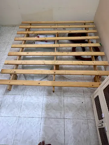 Solid wooden bed slatted base / bed frame slats (used). Mattress not included