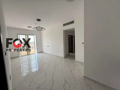 The biggest two rooms and a living room for annual rent in Al-Muweihat 1 area, with a balcony, spacious area, 2 bathrooms, prime location