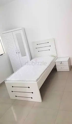 Single white bedroom set: bed, bedside table and wardrobe - new