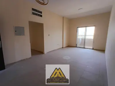 An excellent annual rental opportunity in Al Rashidiya 2, Ajman. This spacious one-bedroom apartment with a balcony