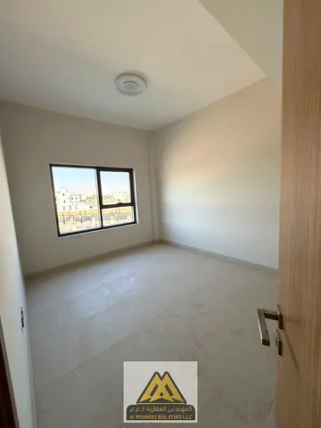 Spacious apartment | Prime location in Al Zahia, Ajman | Balcony | Split air conditioning | Semi-open kitchen | Vibrant location close to all services