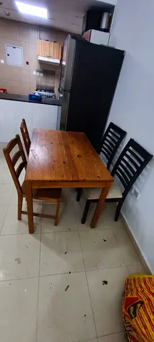 Solid Wood Dining Table with 4 Chairs — Compact and Sturdy طاولة طعام مع 4 مقاعد
