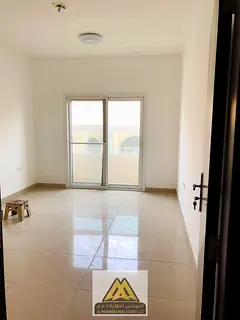 Two-bedroom apartment with separate living room and master bedrooms for annual rent in Al Jurf 2, Aj